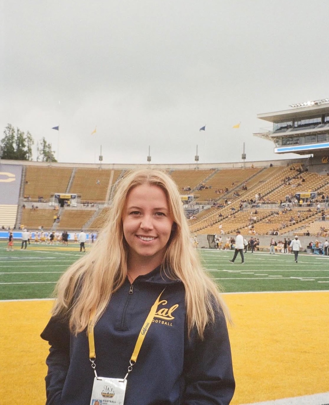 Isabella on the sideline at a Cal football game